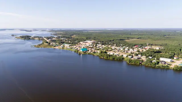 Aerial view of Pinehouse along the lake shore